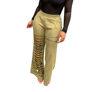 Women's olive green casual jogger pants with ripped holes and metal zipper details