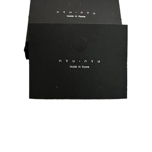 Matte black jewelry display cards for earrings and necklaces with white logo print