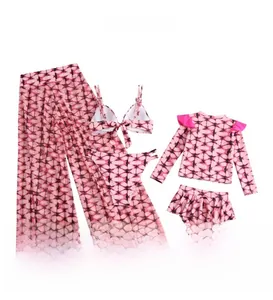 Detailed five-piece swimwear set featuring pink tie-dye patterns and ruffled sun protection top