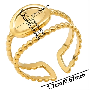 Detail view of adjustable gold stainless steel ring with oval plate and textured bands