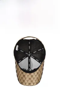 Detail view of khaki baseball cap interior showing breathable mesh and logo tape