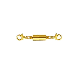 Close-up of golden cylindrical magnetic clasp with lobster clasps for jewelry making