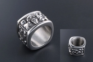 Macro shot of vintage skull relief details on oversized titanium steel ring for men