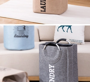 Detail of soft foam-padded metal handles on canvas laundry basket showing material texture