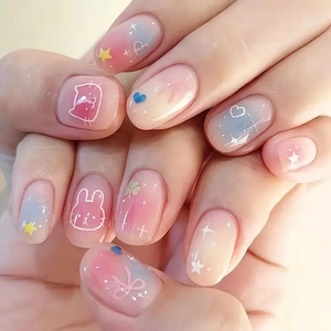 Easter press-on nails set with cute cartoon bunnies and pastel gradient colors