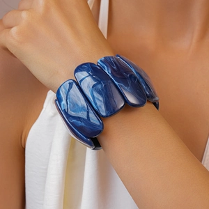 Detailed close-up of chunky blue marble resin bracelet with rectangular acrylic segments