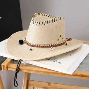 Men's beige woven straw cowboy hat with shell beads and adjustable chin strap