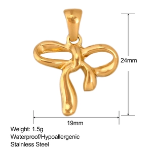 Golden stainless steel bow pendant measuring 24mm by 19mm with a polished metallic finish
