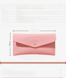 Close-up of pink PU leather makeup brush bag with dimensions 23cm by 12cm and snap button