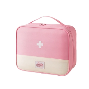 Pink and beige portable first-aid pouch with cross embroidery and double zippers
