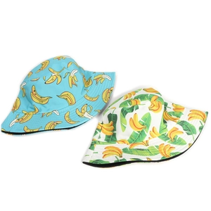Detail showing tropical banana print on reversible cotton bucket hats for summer sun protection