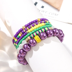 Bohemian multilayer beaded bracelet set with purple faux pearls and green clay beads