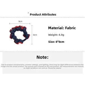 Detail specifications of denim blue scrunchie with red wavy edge, 8x8cm size and 4.9g weight