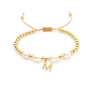 Baroque natural pearl bracelet with 18K gold beads and letter M charm on woven cord