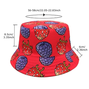 Red bucket hat with strawberry and raspberry pattern showing size measurements