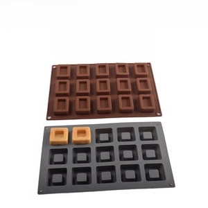 Detail of 15-cavity rectangular silicone mold for chocolate making and DIY crafts