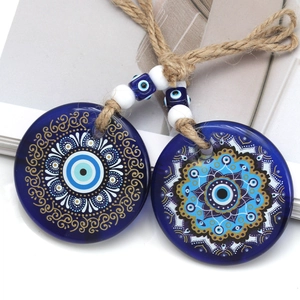 Blue glass evil eye pendants with mandala patterns and jute rope for car decor