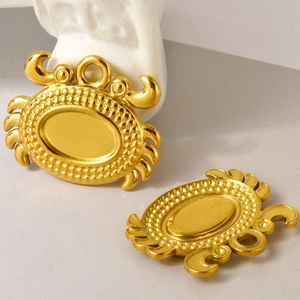 Detailed macro view of 18K gold plated 304 stainless steel crab charms for DIY jewelry