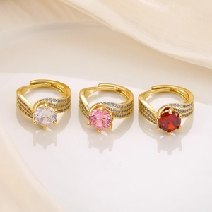 Three-row twisted zircon rings in gold finish with white, pink and red center stones