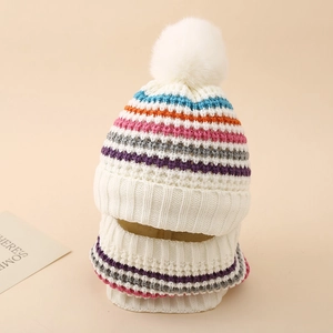Detail of knit hat and scarf set with rainbow stripes and soft fleece lining