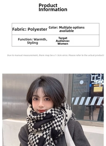 Close-up detail of classic black and white plaid scarf with soft polyester knit texture