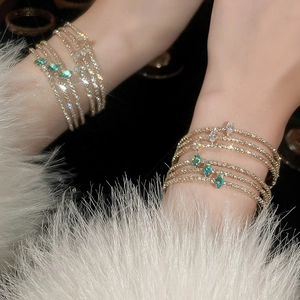 Sparkling multi-layer gold bracelet with green and white marquise cut zircon for women