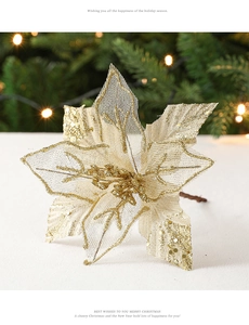 Detailed view of a golden glitter poinsettia flower with mesh petals for Christmas decor