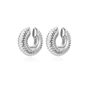 Detailed view of silver twisted spiral ear cuffs with elegant polished metallic reflection