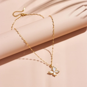 Gold plated butterfly necklace with white shell inlay and zircon accents on chain