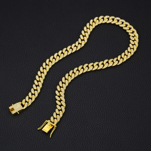 Classic 13mm gold plated cuban link necklace with diamonds on black leather background