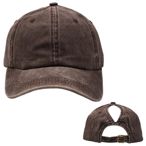 Macro shot of dark brown washed cotton baseball cap with ponytail hole and metal buckle