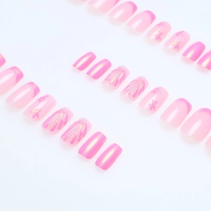 Pink pearl press-on nails with 3D shell and star patterns for an elegant manicure
