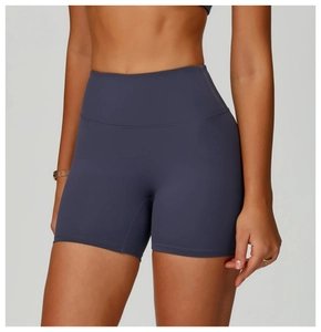 Close-up of high-waisted recycled yoga shorts showing elastic waistband and fabric texture