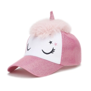 Detailed close-up of girls unicorn baseball cap with pink sequins and faux fur pom-pom