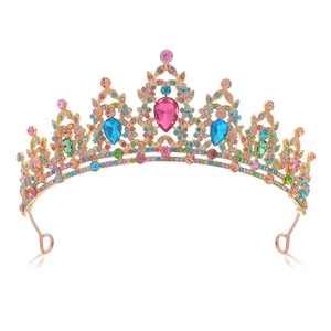 Elegant gold bridal tiara with colorful gemstones and rhinestones for wedding banquet
