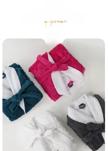 Detailed view of folded thick flannel bathrobes in four colors with matching waist belts