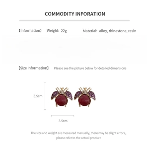 Detailed chart showing vintage beetle earrings with size, weight, and alloy materials