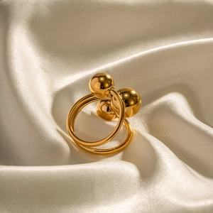 Exaggerated 18K gold plated stainless steel open ring featuring three polished spheres