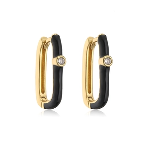 Detail of 18K gold-plated geometric earrings with black enamel and sparkling zircon