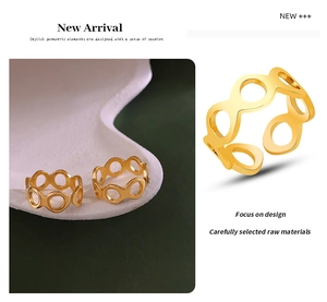 Detailed macro view of gold-plated hollow geometric 8-shape open ring with metallic luster