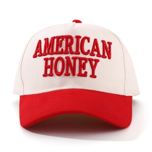 Classic red and white baseball cap with American Honey embroidery and curved brim