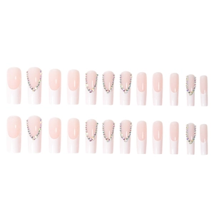 French long coffin press-on nails set with classic white tips and sparkling rhinestones