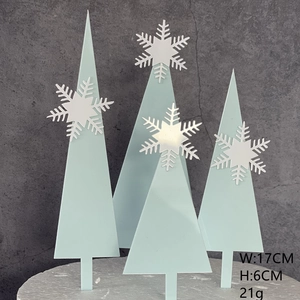 Acrylic Christmas tree cake toppers set with white snowflakes for festive holiday party.