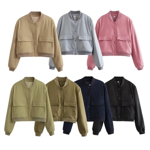 Flat lay view of women's short bomber jackets in seven colors with large flap pockets