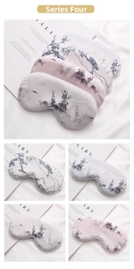 Detail of silk-like sleep masks with Chinese ink painting patterns for travel