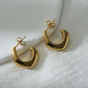Polished 18k gold plated stainless steel C-shaped stud earrings in a modern U-style