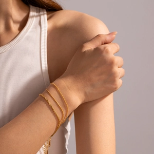 Set of three gold-plated titanium steel chains including rope, snake, and ball chain styles