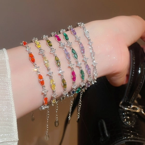 Macro view of crystal bracelets with vibrant marquise-cut zircon stones and silver finish
