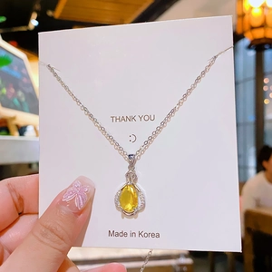 Silver titanium necklace with yellow teardrop zircon perfume bottle pendant for women