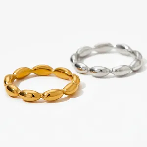 Minimalist stainless steel oval bead rings in polished gold and silver finishes